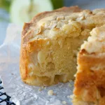 Close up view of apple cake to show fluffy texture