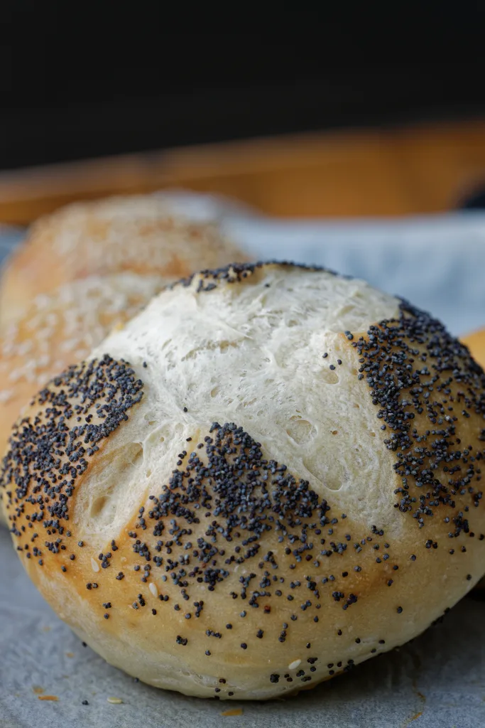 Soft burger bun with poppy seed topping