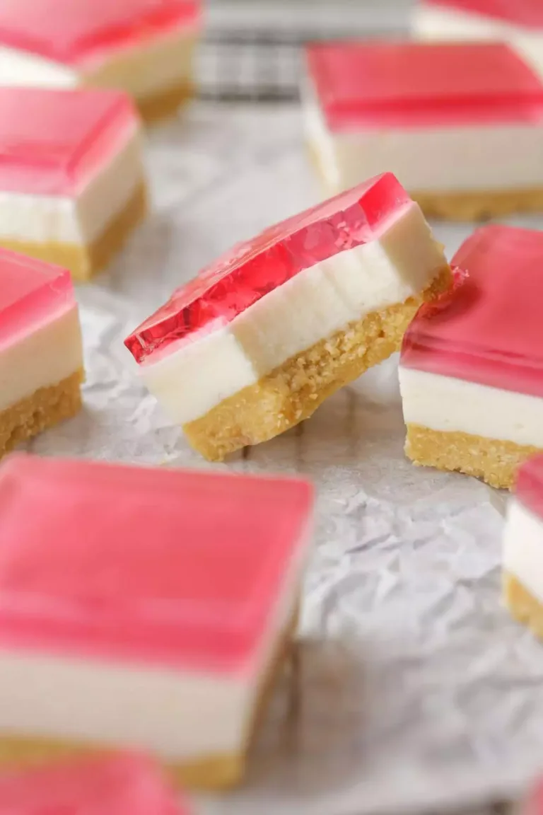 Squares of Jelly slice on baking paper