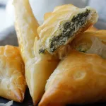 Stack of filo pastries filled with spinach & Ricotta