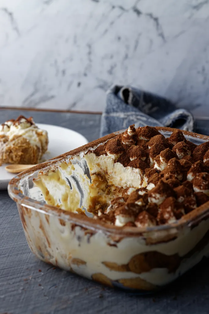 Tiramisu in clear glass dish to show layers