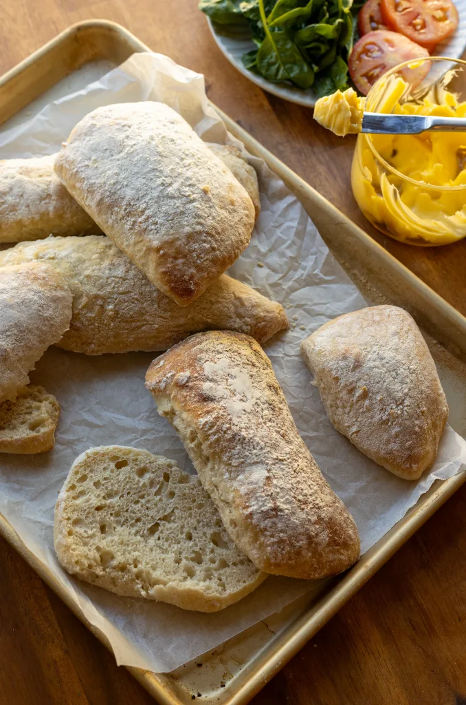 ciabatta bread rolls stacked and dusted with flour