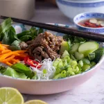 Vietnamese Noodle salad with beef and vegetables