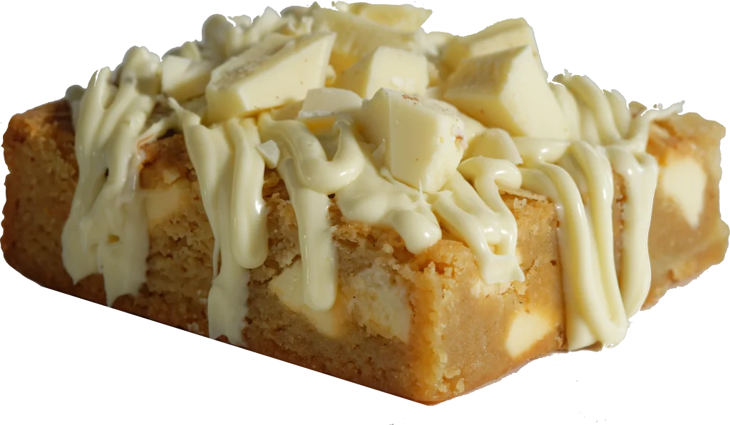White Chocolate loaded blondie topped with tempered white chocolate and chunks.