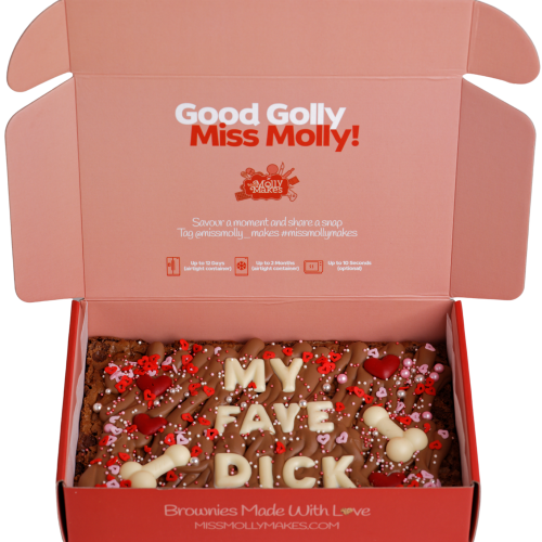 Naughty brownie slab with 'MY FACE DICK' in white chocolate letters and sprinkles