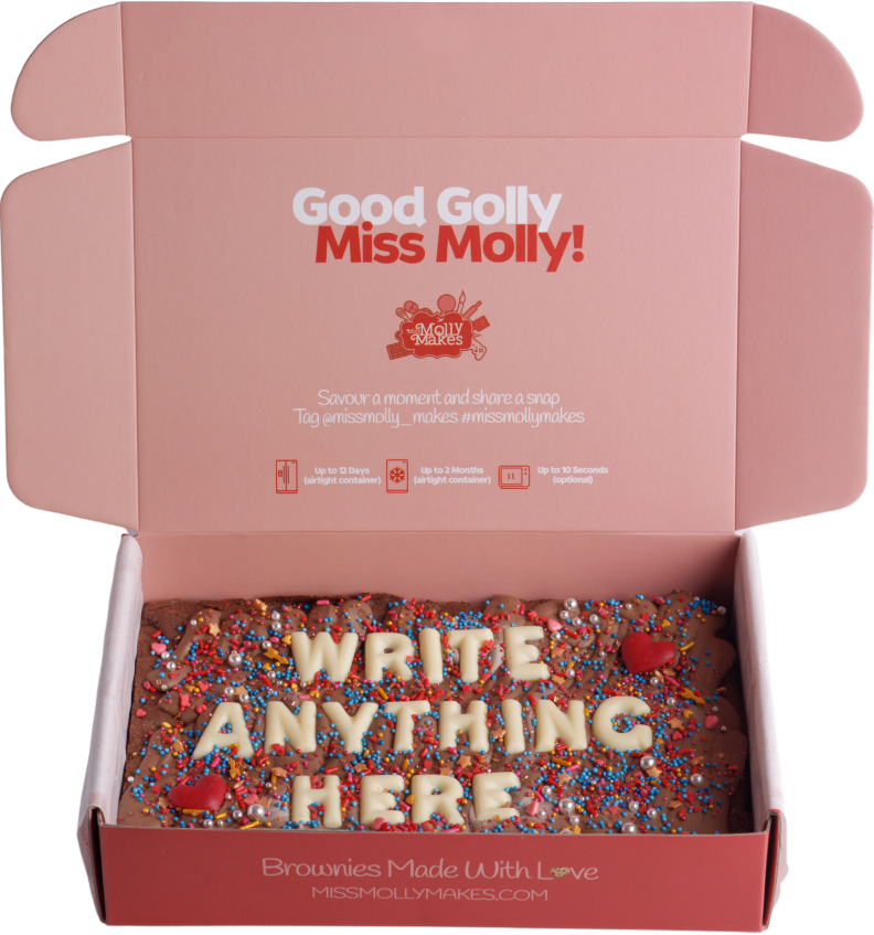 Slab of brownie with 'Write Anything Here' in white chocolate letters and sprinkles