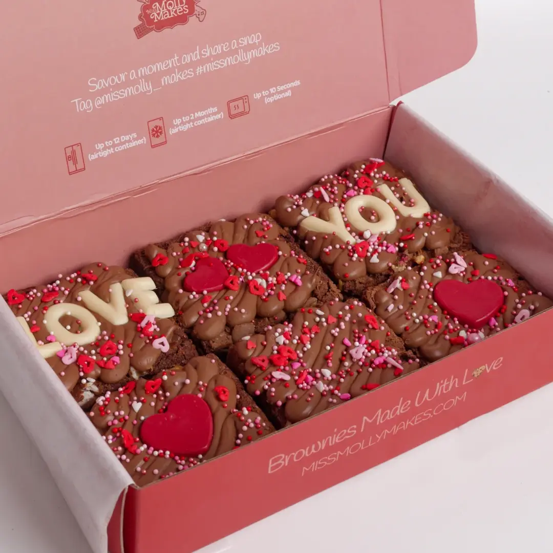 Love Brownies – Miss Molly Makes themed brownie with heart sprinkles, red chocolate hearts and 6 brownie pieces